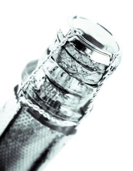 neck of a bottle of champagne closed on white isolated background