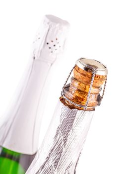 two closed bottle of champagne isolated on a white background