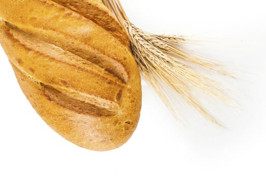 bread with ears of wheat on a white background isolated
