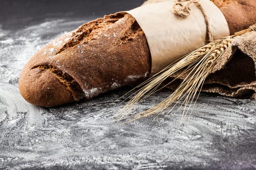 Baton dial with ears of wheat on a dark background