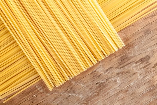 pasta posted on the a row on a wooden background