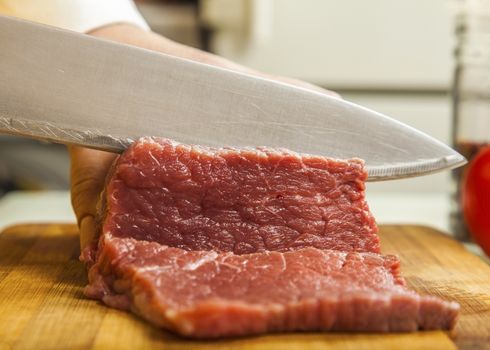 Cook chopped fresh fillet of beef knife closeup