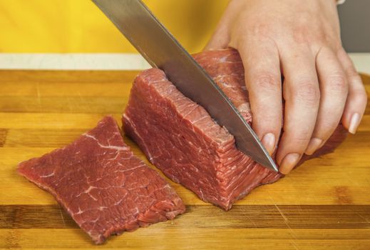 Cook chopped fresh fillet steak knife closeup