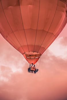 Air Balloon closeup flying high in the clouds