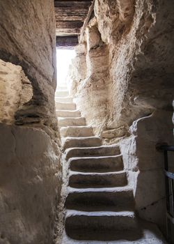 ancient stone stairs leading to the exit