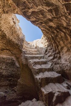 entrance into the cave, summer day