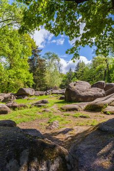 landscape, large rocky boulders and green trees