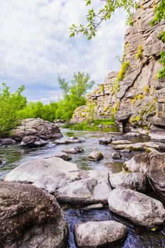 picturesque landscape mountain river with large boulders