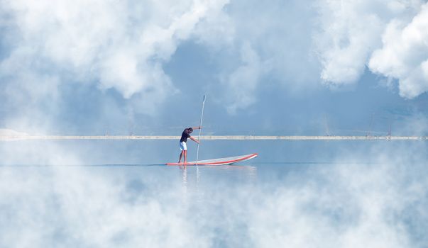 guy surfing vacation at sea tourism