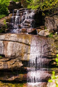 landscape waterfall trickling down the cliff close-up