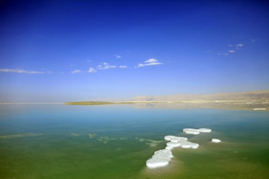 view of the island of Dead Sea salt Israel during the day