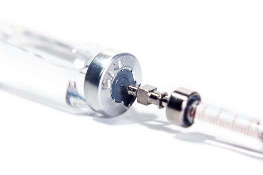 syringe with drugs closeup, medicine background