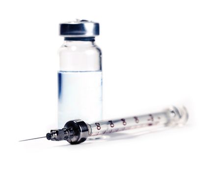 syringe with bottle closeup, medicine background