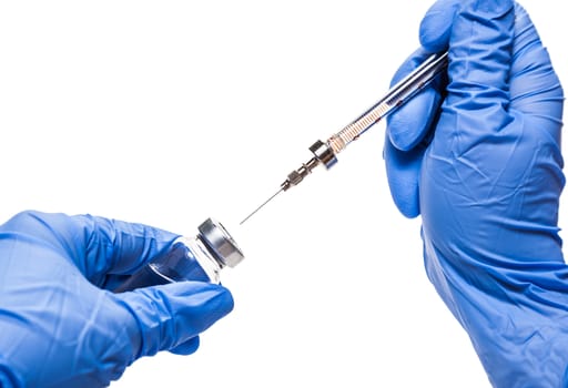 Doctor gaining a vaccine for injection isolated