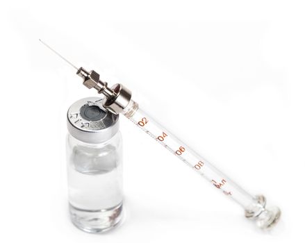 vial and syringe with medicine on an isolated white background