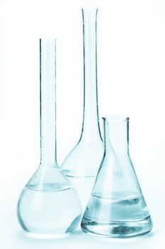 variety of glass bulbs with reagents on a light background