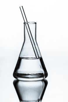 chemical glass flask closeup on a light background