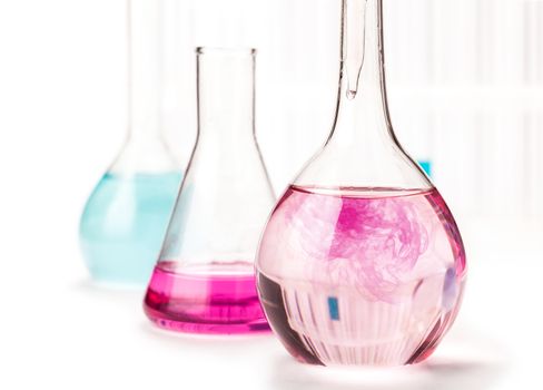 flask with reagent pink on a white background