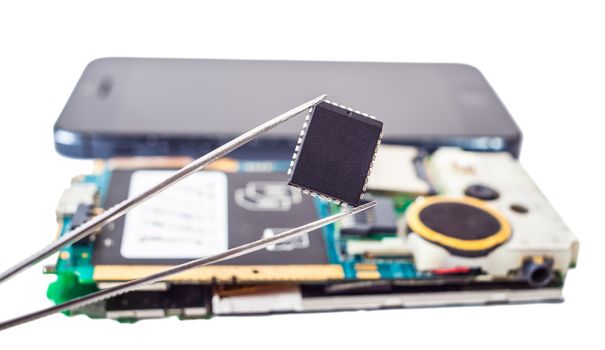 tweezers with detail and disassembled phone on white isolated background