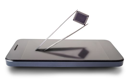 tweezers with a piece of the phone isolated on white background