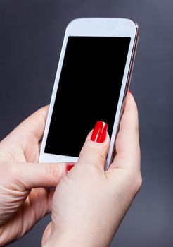 white smartphone in female hands, communication background