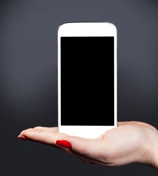 white smartphone on a female hand, the communication background