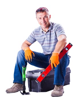 man sitting on a box with tools isolated white background