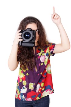 Cute curly girl with camera isolated on white background