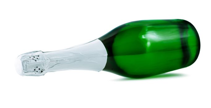 bottle of champagne lying on a white background isolated