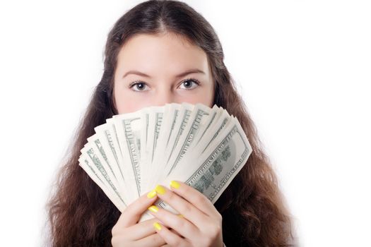 portrait of a teen brunette girl with money isolated