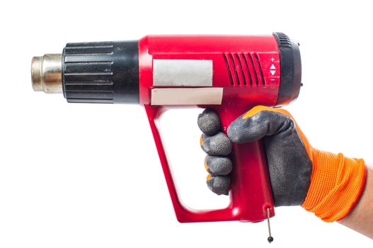 thermoelectric gun in man's hand isolated  white background