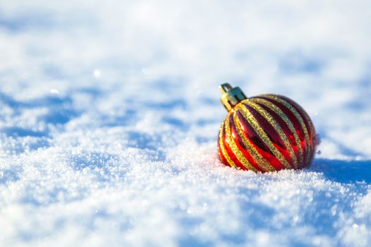 toy lying in the snow, Christmas background