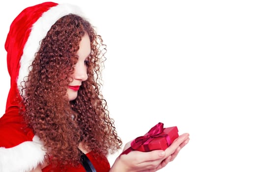 pretty curly girl as Santa with Christmas presents isolated