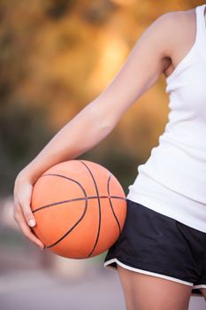 a basketball in his hands, a healthy lifestyle