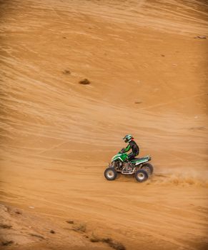 one rider through the desert, summer day