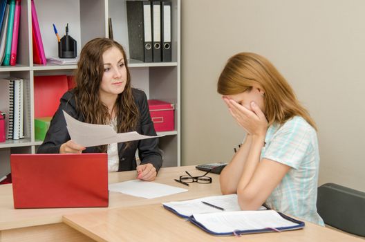 Young beautiful girl on reception at the office specialist