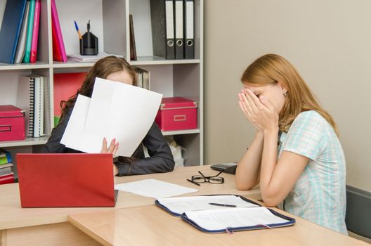 Young beautiful girl on reception at the office specialist