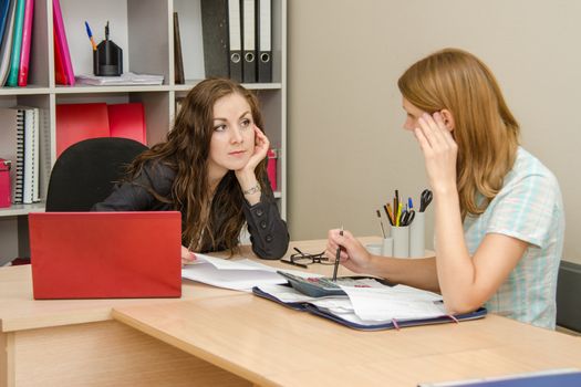 Young beautiful girl on reception at the office specialist