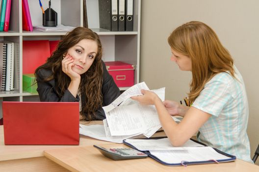 Young beautiful girl on reception at the office specialist