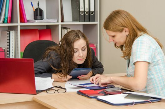 Young beautiful girl on reception at the office specialist