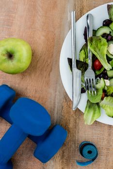 Ingredients for a healthy lifestyle on wooden table