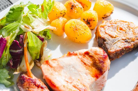 Tasty Sunday lunches, various kinds of meat with potatoes and salad.