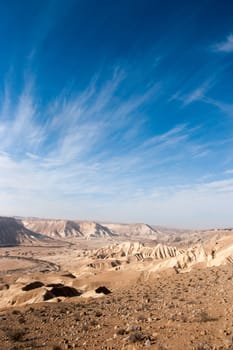 Stone desert tourism hiking in mountains under blue sky