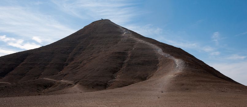 Stone desert tourism hiking in mountains under blue sky