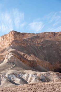 Stone desert tourism hiking in mountains under blue sky