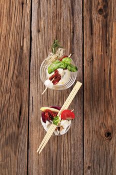 Cheese appetizers in glass dishes - overhead