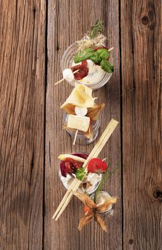 Cheese appetizers in glass dishes - overhead