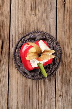 Red bell pepper filled with curd cheese