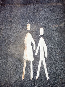 Pedestrian sign painted on a pavement