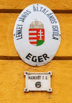 Old street sign in the city of Eger, Hungary